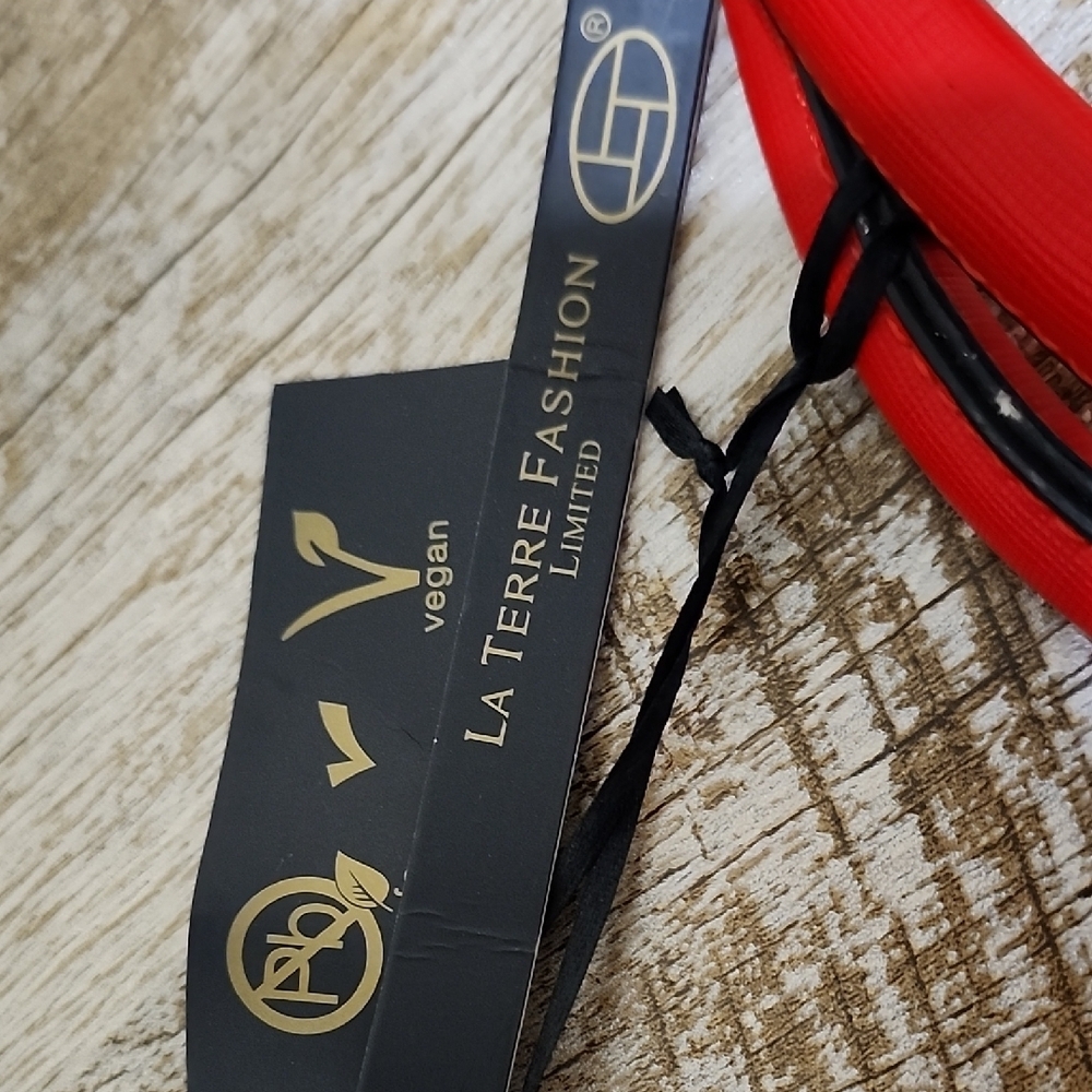 Chic Red Handbag with Gold Accents - Picture 2 of 13